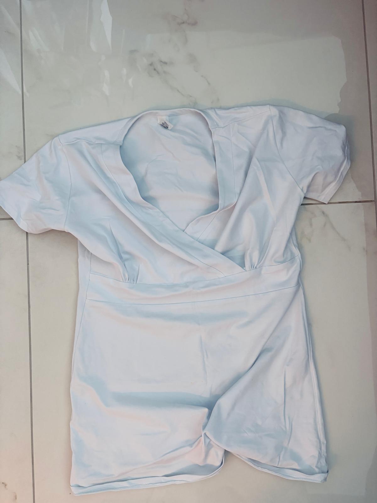 White wrap-front maternity top - photo 1
